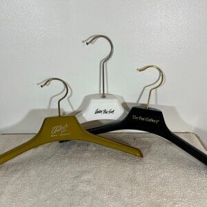 1 Plastic coat hanger - wide shoulders perfect for fur coats jackets black gold